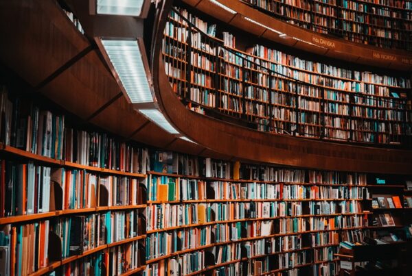 photo of brown wooden bookshelf